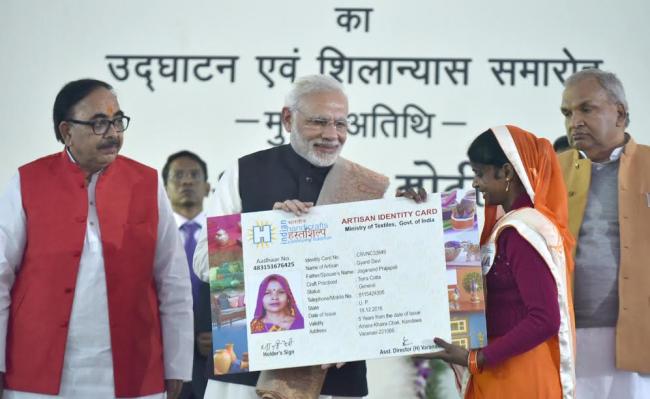 Narendra Modi being received on his arrival, at Varanasi, Uttar Pradesh