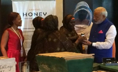 Solar Mamas present a skill demonstration to PM Modi in Dar-es-Salaam