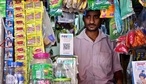 Kolkata: People queue in front of banks, ATMs to get cash