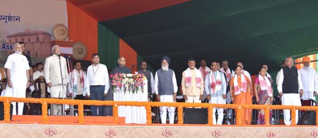 Narendra Modi being received by the Governor of Assam