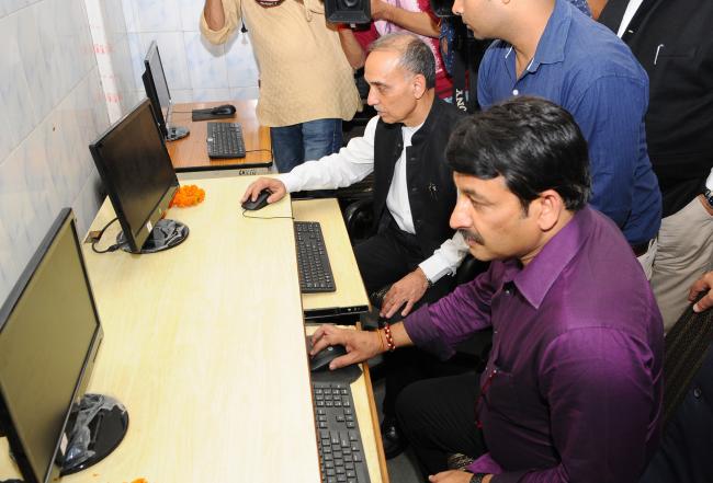 Minister of State for Human Resource Development addressing inauguration of the E-Library