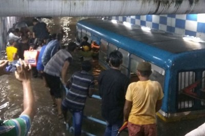 Over 40 passengers rescued unhurt from sinking bus on waterlogged Kolkata street