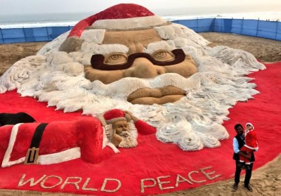 Artist Sudarshan Pattnaik creates world's largest sand Santa Claus face on Puri beach 