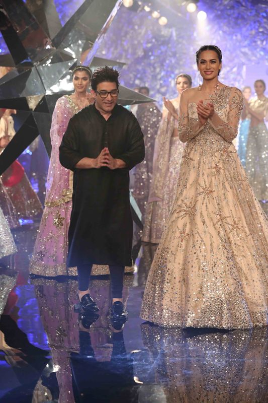 Models walk for Suneet Varma in India Couture Week