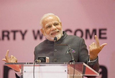 PM Modi gifts cows to villagers at Rweru Model village