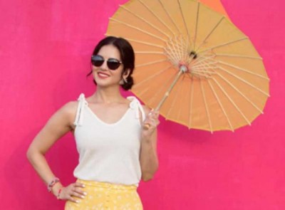 Sunny Leone shares her cute image with an umbrella
