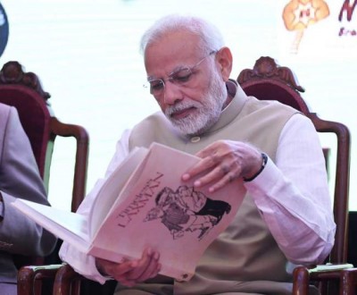 PM Narendra Modi releases the book "Timeless Laxman"