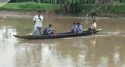 Lack of infrastructure forces students to cross river to reach school in Assamâ€™s Nagaon district
