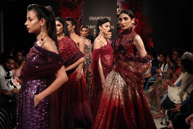 Models walk the ramp for Tarun Tahiliani's show