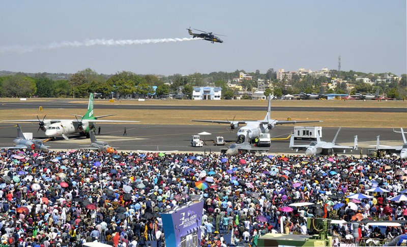 Visitors witness the last day of Aero India Show