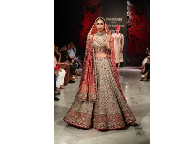 Models walk the ramp for Tarun Tahiliani's show