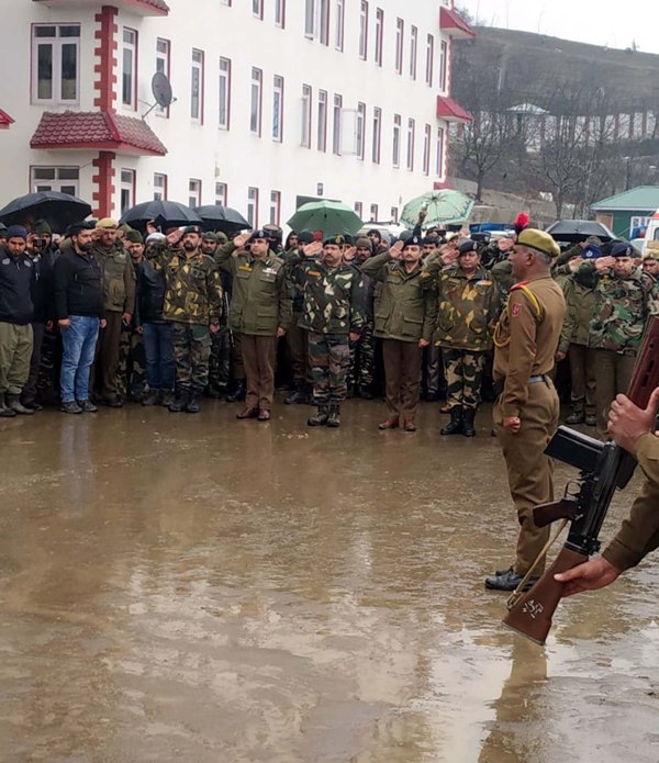 Kupwara encounter:  Senior police, CRPF and Army officils giving salute to deceased soldiers