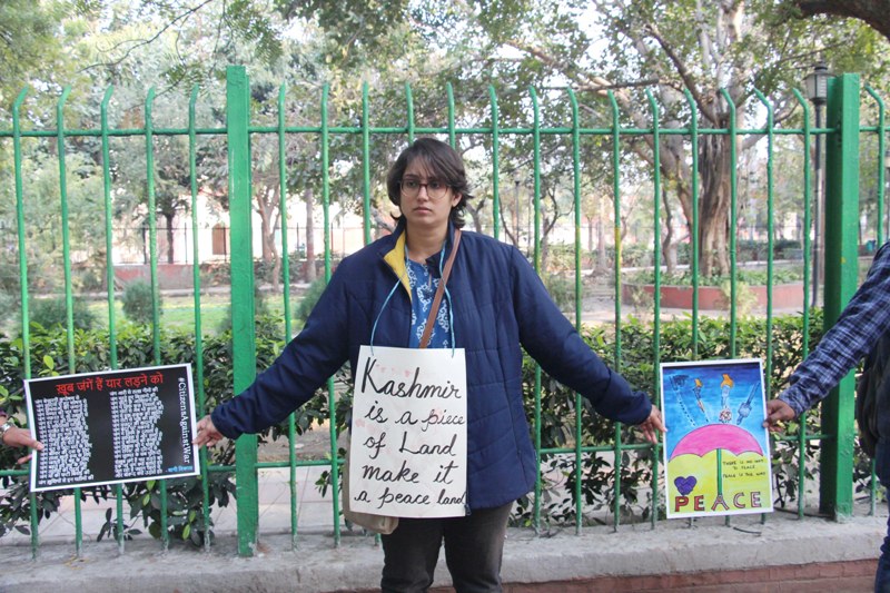 Members of Citizen Against War form human chain for peace