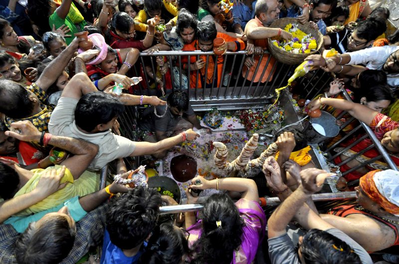 People gather in large numbers at temple for Maha Shivaratri