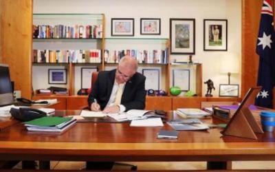 Australian PM apologises for going on holiday amid wildfire emergency