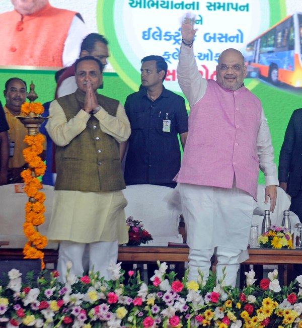 Amit Shah with Vijay Rupani at Plantation Drive and flagging off of vehicles in Ahmedabad