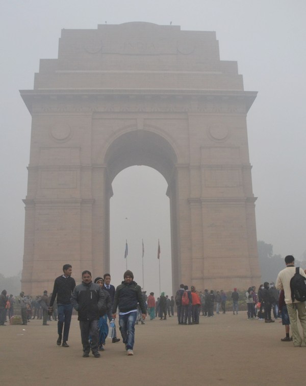 Visitors wrap themselves in warm clothes in New Delhi
