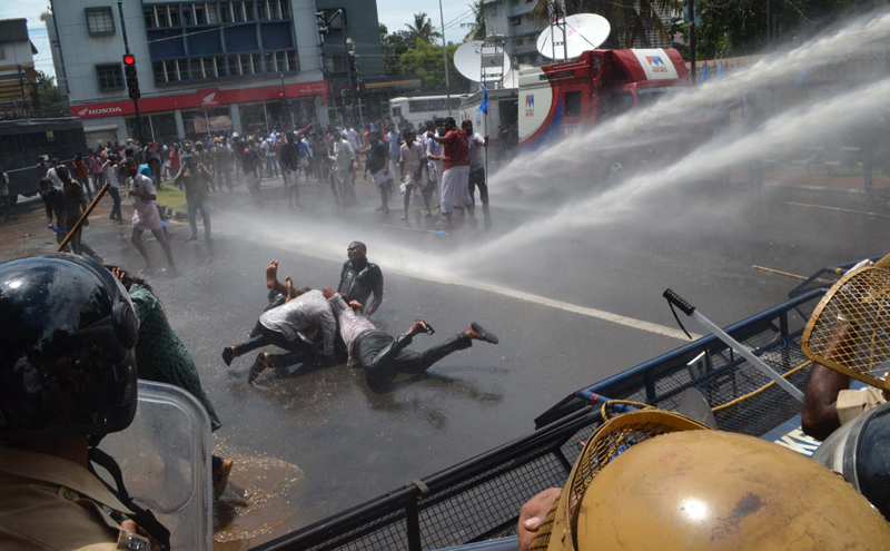 Police using water cannons to disperse KSU workers demanding resignation of Kerala Higher Education Minister K T Jaleel