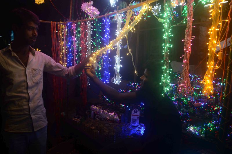 People shopping Diwali lights ditching covid scare