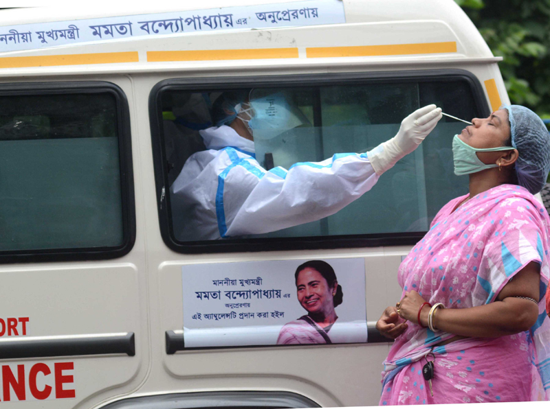 Health workers in Kolkata collect samples for Covid testing