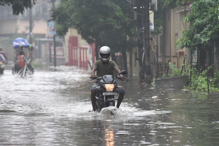 Waterlogged street in Patna makes people suffer