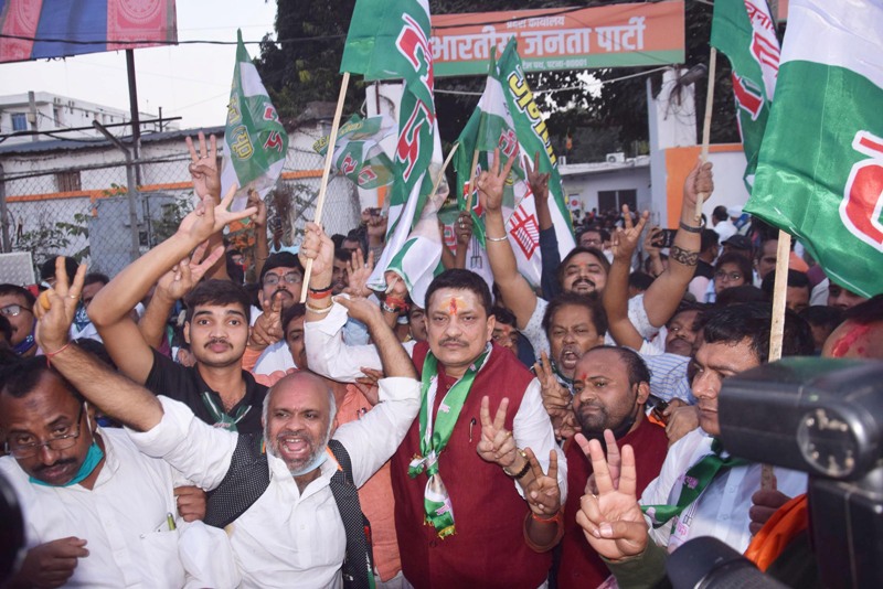 NDA workers celebrate party victory in Bihar Assembly elections in Patna