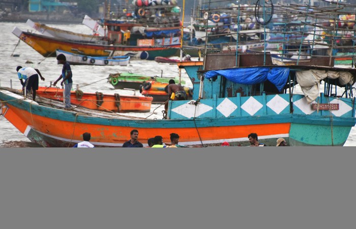 Mumbai fishermen return from sea in Mumbai