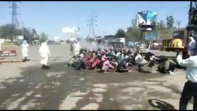 Migrant workers in Bareilly forced to take open bath with chlorinated water