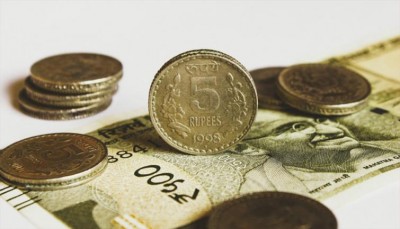 Indian Rupee improves by 2 paise against USD