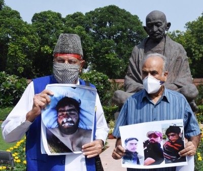 Farooq Abdullah, Hasnain Masoodi protest during Parliament’s monsoon session