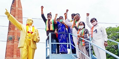 BJP SC Morcha activists garland statue of Dr B R Ambedkar