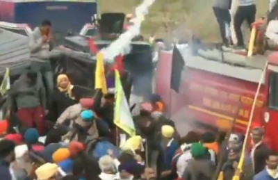 Farmers clash with police in march to Delhi against farm laws, tear gas used