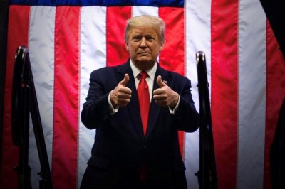 Donald Trump signs spending bill that includes Coronavirus relief legislation