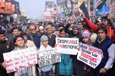 Delhi University students protest against JNU violence and CAA