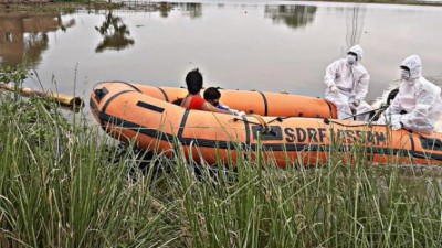 SDRF team rescues coronavirus patients from flood-affected area in Assam's Nagaon 