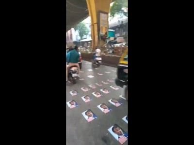 French president Emanuel Macron's pics pasted on busy Mumbai road