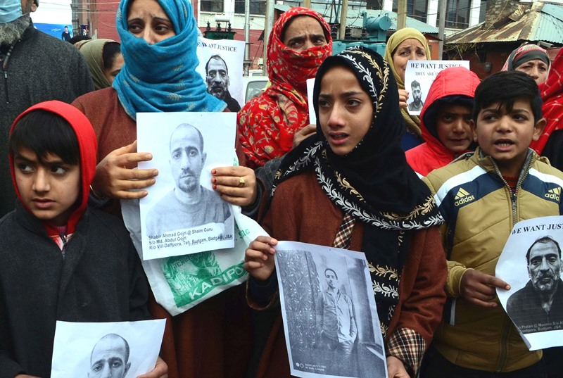 Family members of men arrested by Delhi Police protest in Srinagar