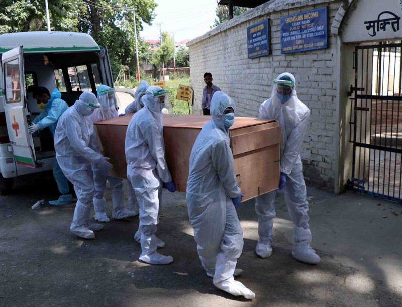 Son performs last rites of his paramilitary father soldier in Srinagar