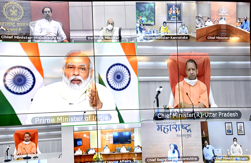 Prime Minister Narendra Modi interacing with Uttar Pradesh Chief Minister Yogi Aditiyanath