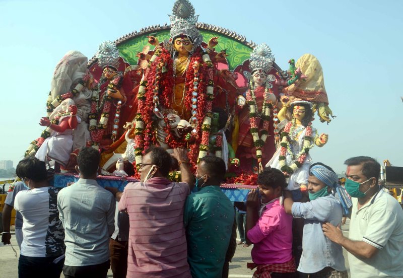 Glimpses of immersion of Goddess Durga's idols at Kolkata's Babughat