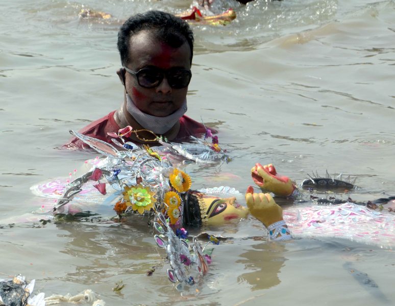 Glimpses of immersion of Goddess Durga's idols at Kolkata's Babughat