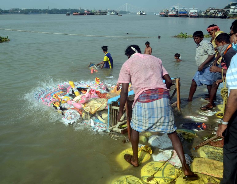 Glimpses of immersion of Goddess Durga's idols at Kolkata's Babughat