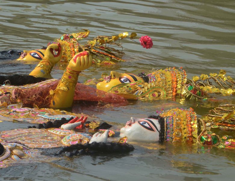 Glimpses of immersion of Goddess Durga's idols at Kolkata's Babughat