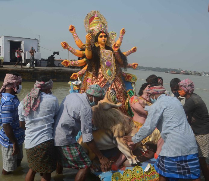 Glimpses of immersion of Goddess Durga's idols at Kolkata's Babughat