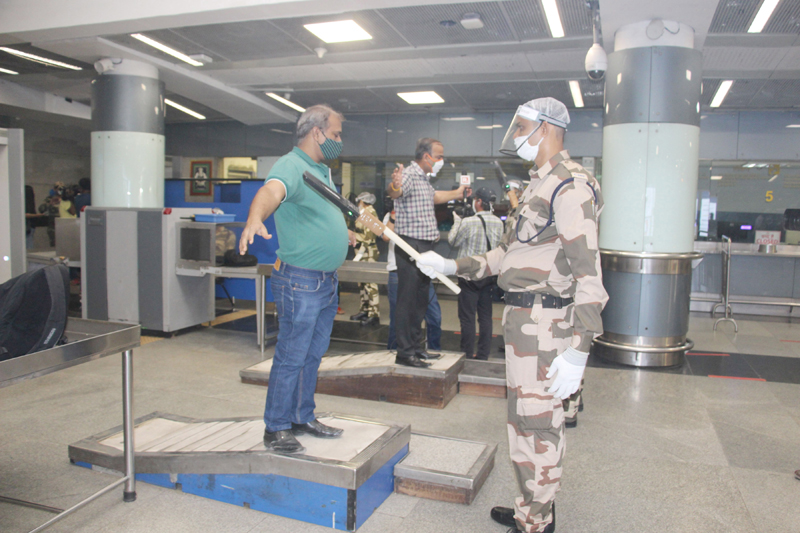 DMRC workers sanitizing Rajiv Chowk Metro Station ahead of resumption of metro services