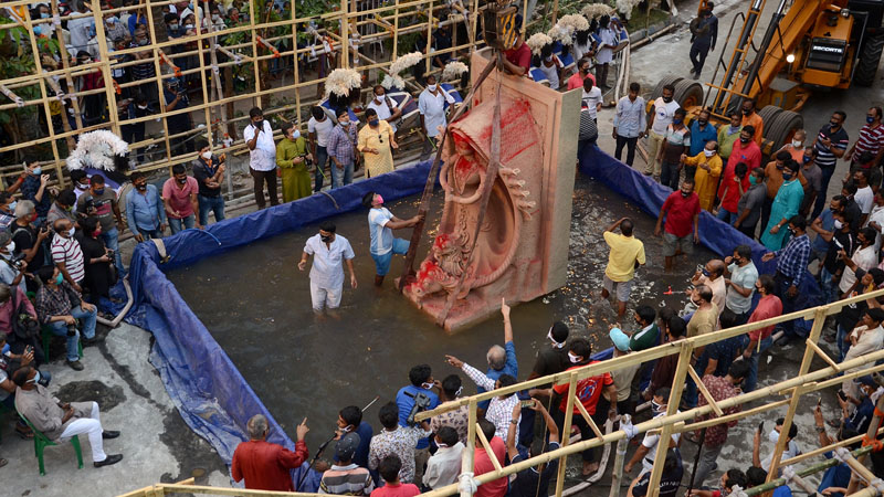 Unique Durga idol immersion in Kolkata by Tridhara Sammilani