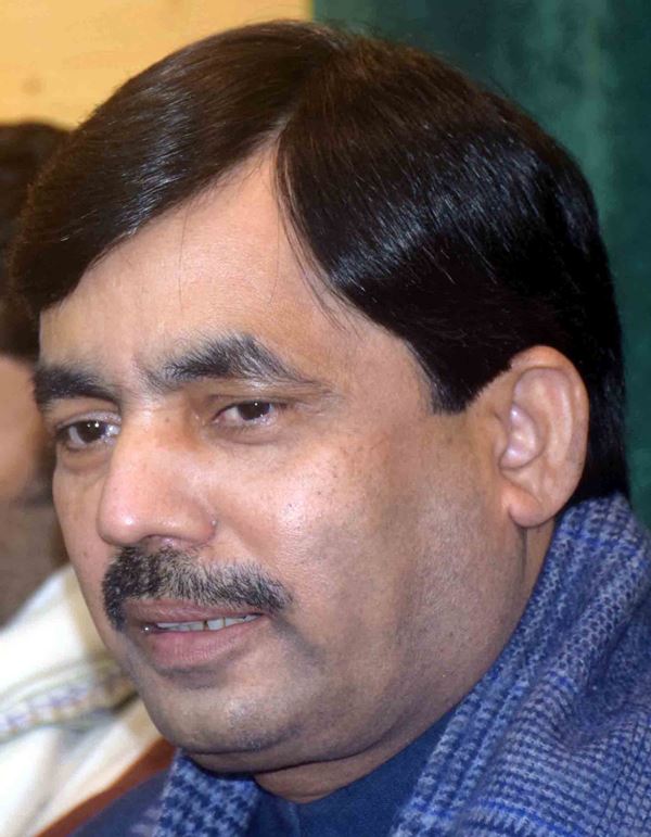 BJP Spokesperson Syed Shahnawaz Hussain addressing media at Kashmir press club in Srinagar