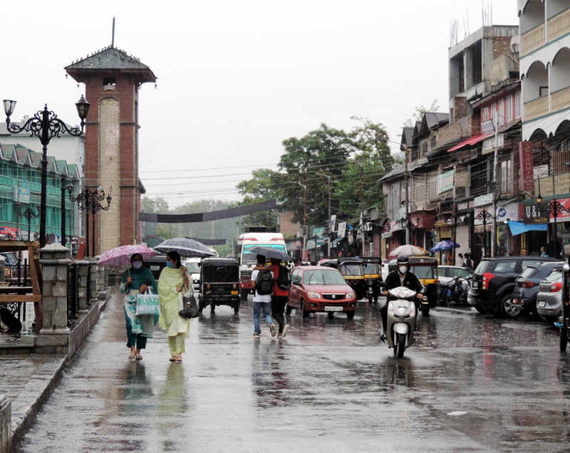 People walking down the Lal Chowk in Srinagar
