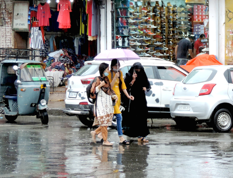 People walking down the Lal Chowk in Srinagar