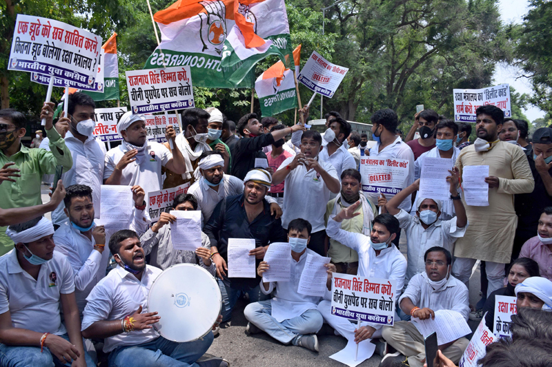 Indian Youth Congress activists demonstrate outside Rajnath Singh residence
